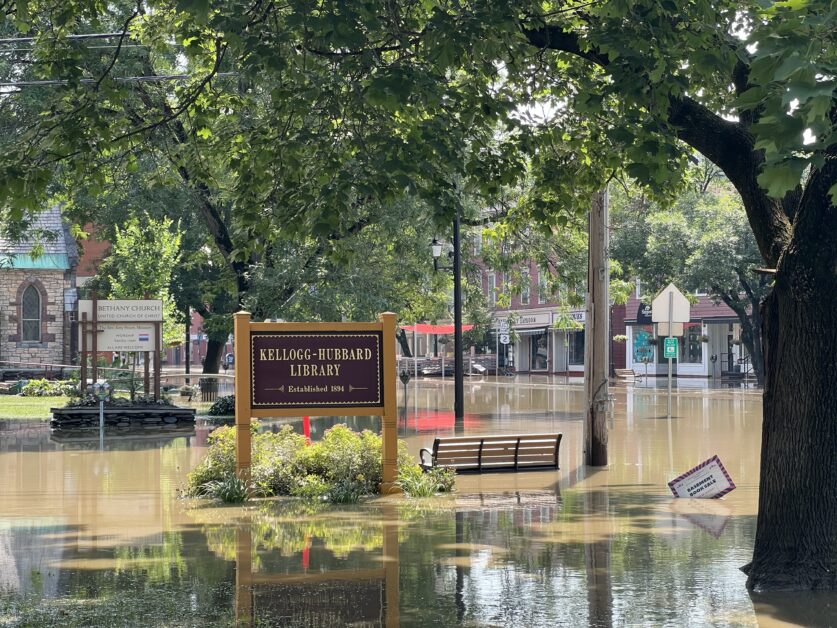 Flood waters cover the ground around Kellogg-Hubbard Library in Montpelier, VT, on July 11, 2023.